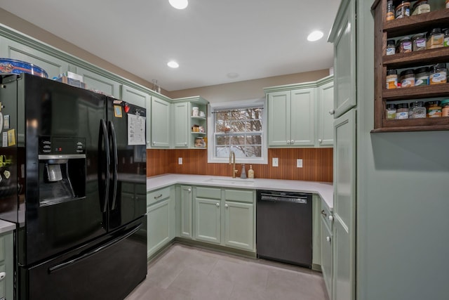 kitchen featuring light tile patterned floors, open shelves, a sink, light countertops, and black appliances