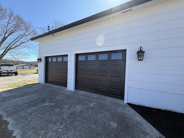 garage with driveway