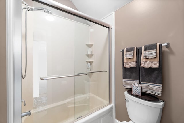 full bathroom with toilet and enclosed tub / shower combo