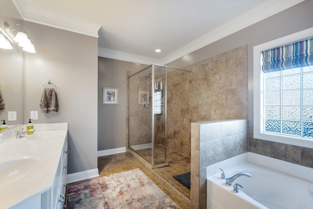 bathroom with ornamental molding, a sink, a bath, and a shower stall