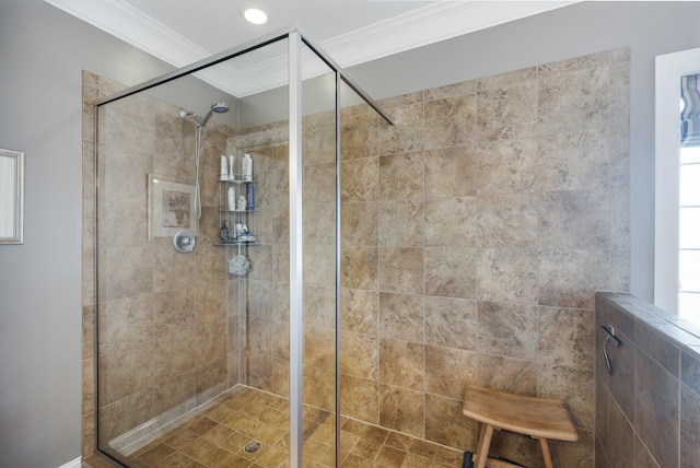 full bathroom featuring a shower stall and crown molding