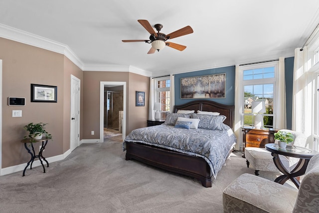 bedroom with carpet, multiple windows, baseboards, and crown molding