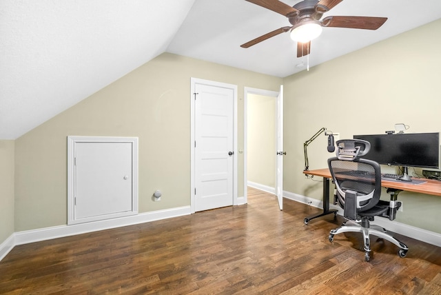 home office featuring a ceiling fan, lofted ceiling, baseboards, and wood finished floors