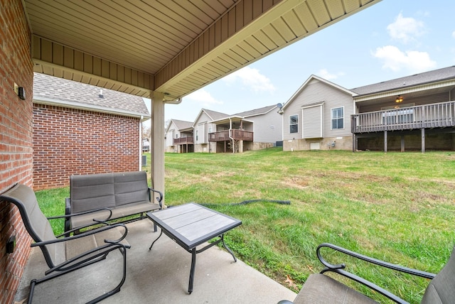 view of yard with a patio area and a residential view