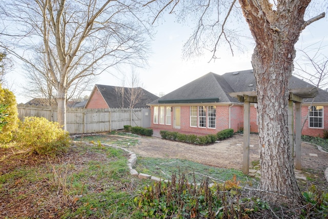 exterior space featuring fence