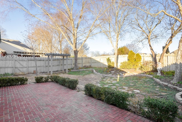 view of patio / terrace featuring a fenced backyard and a pergola