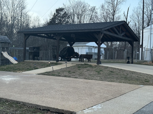 110 Turman St N, Waynesboro, TN 38485 - view of home's community with a carport and fence