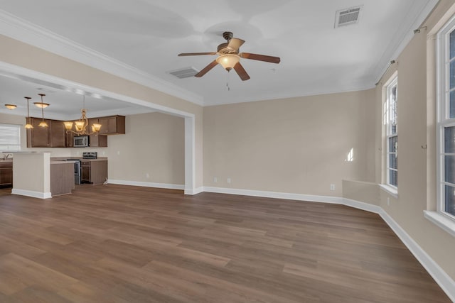 unfurnished living room featuring baseboards, visible vents, and dark wood-type flooring