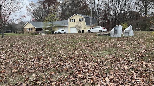 view of yard with a garage