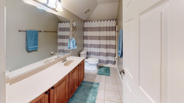 bathroom featuring tile patterned flooring, toilet, vanity, and a shower with curtain