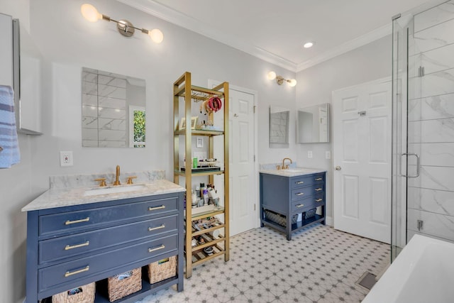 full bathroom featuring crown molding, a stall shower, two vanities, and a sink