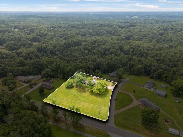 aerial view featuring a forest view