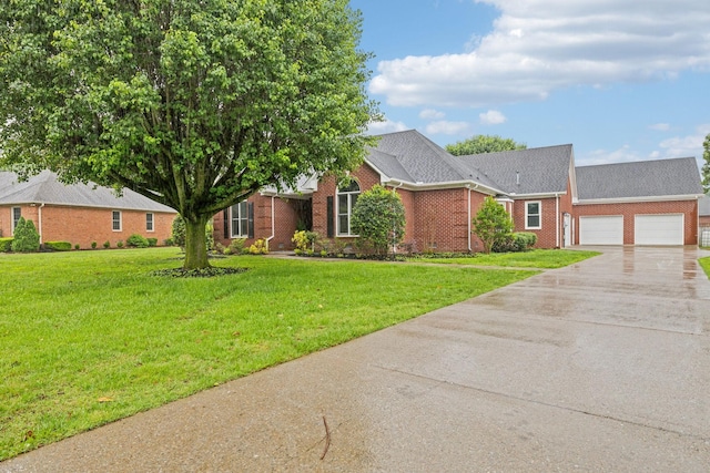 1823 Newton Ave, Murfreesboro, TN 37129 - view of front of house featuring concrete driveway, an attached garage, brick siding, and a front lawn