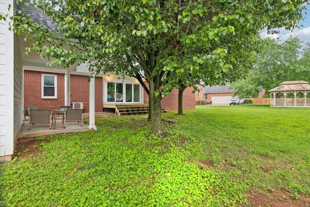 1823 Newton Ave, Murfreesboro, TN 37129 - view of green lawn with a gazebo and a patio area