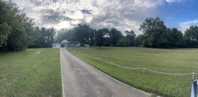 view of road with driveway