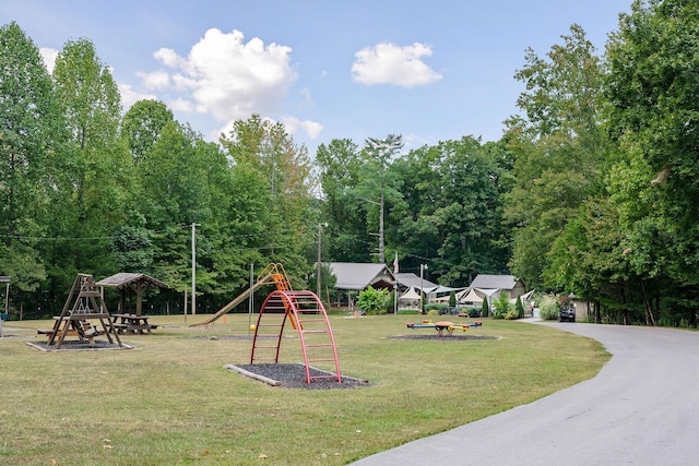 community play area with a yard