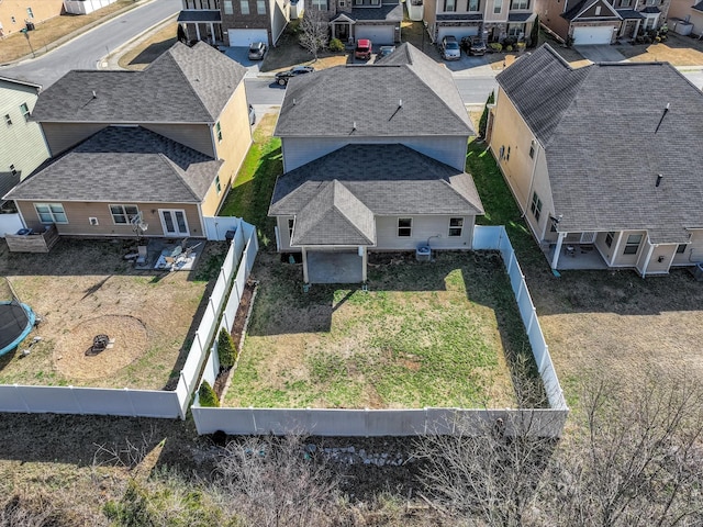 birds eye view of property with a residential view