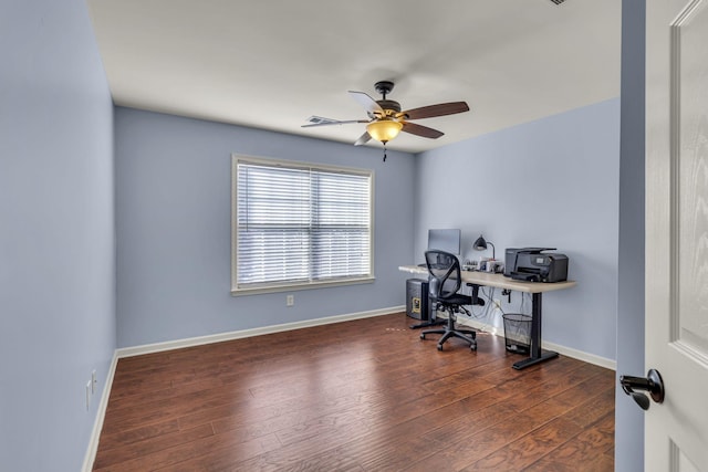 office area featuring a ceiling fan, baseboards, and wood finished floors