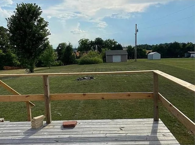 exterior space with an outbuilding, a yard, and a storage shed