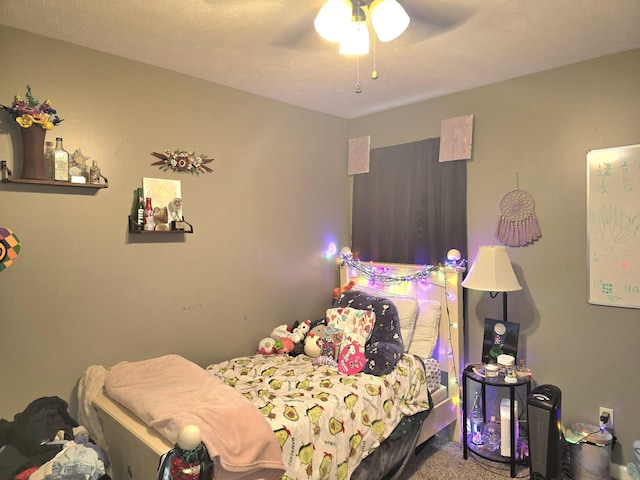 carpeted bedroom featuring a ceiling fan