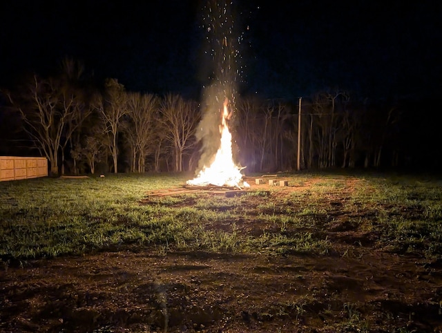 view of yard at night