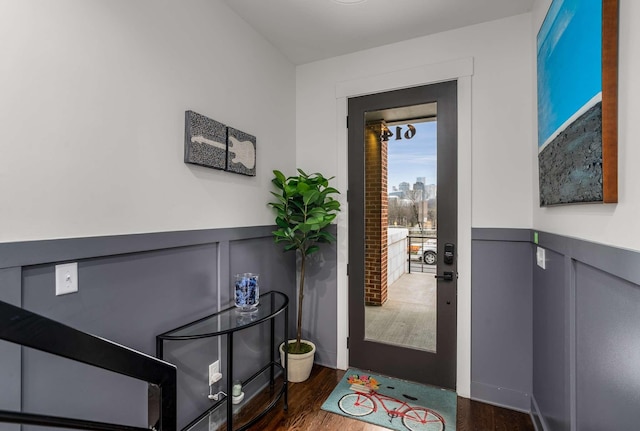 interior space featuring a view of city and a balcony