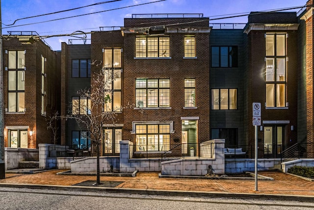 view of property at dusk