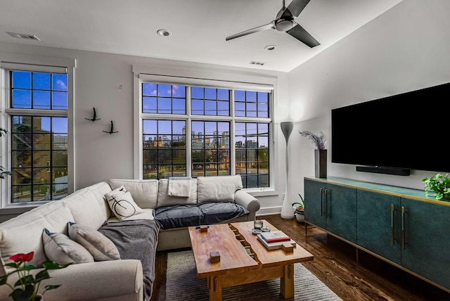 living area featuring dark wood-style floors, visible vents, a ceiling fan, and recessed lighting