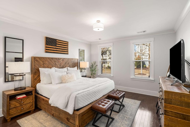 bedroom featuring baseboards, visible vents, dark wood-style flooring, and ornamental molding