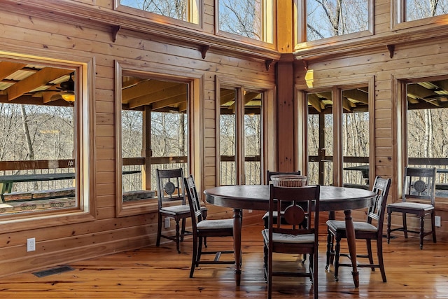 sunroom / solarium with plenty of natural light and visible vents