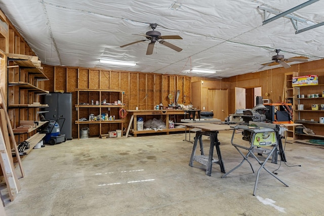 garage with a workshop area