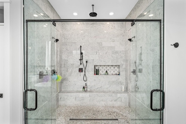 full bathroom featuring a shower stall