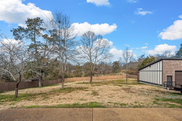 view of yard featuring fence