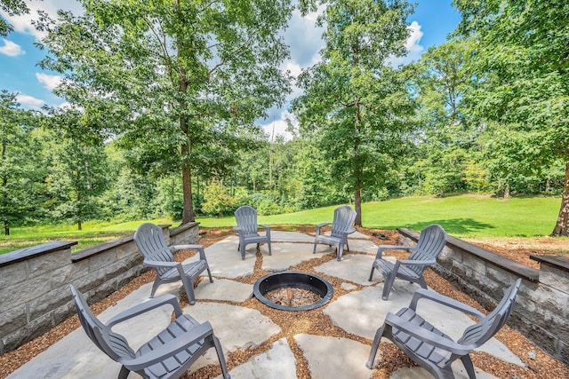 view of patio with an outdoor fire pit