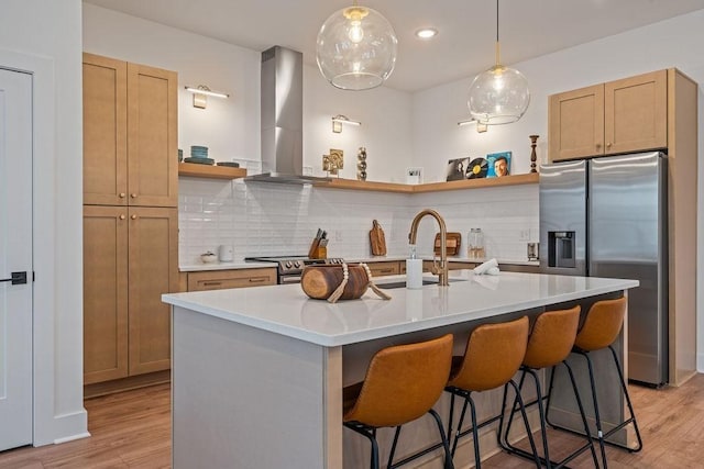 kitchen featuring exhaust hood, light wood-style floors, appliances with stainless steel finishes, backsplash, and open shelves