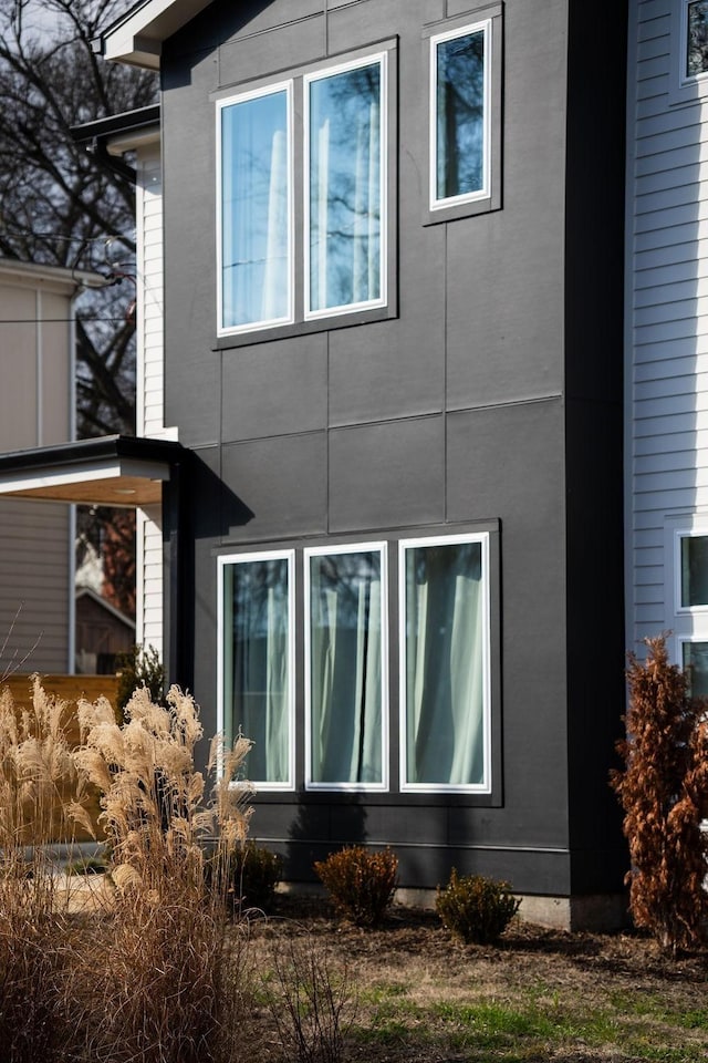 rear view of property with stucco siding