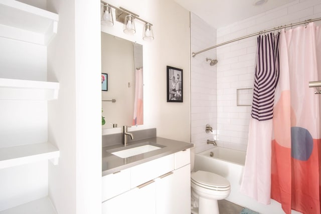 full bathroom with shower / bath combo, vanity, and toilet