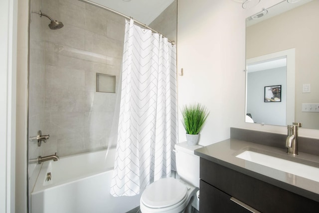 full bathroom with toilet, shower / tub combo, and vanity