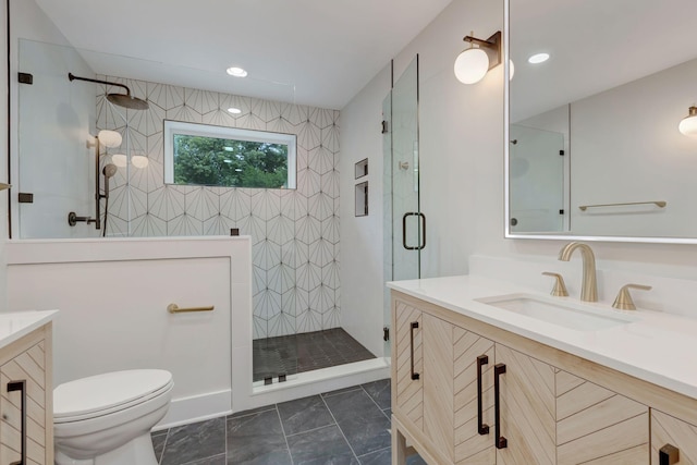 full bathroom featuring recessed lighting, vanity, toilet, and a walk in shower