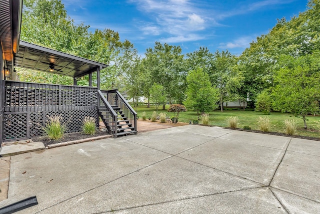 view of patio / terrace featuring ceiling fan and a wooden deck