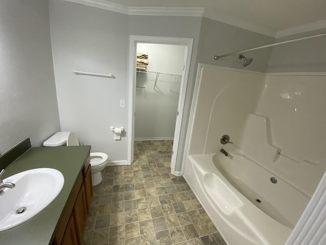 bathroom featuring baseboards, tub / shower combination, toilet, and crown molding