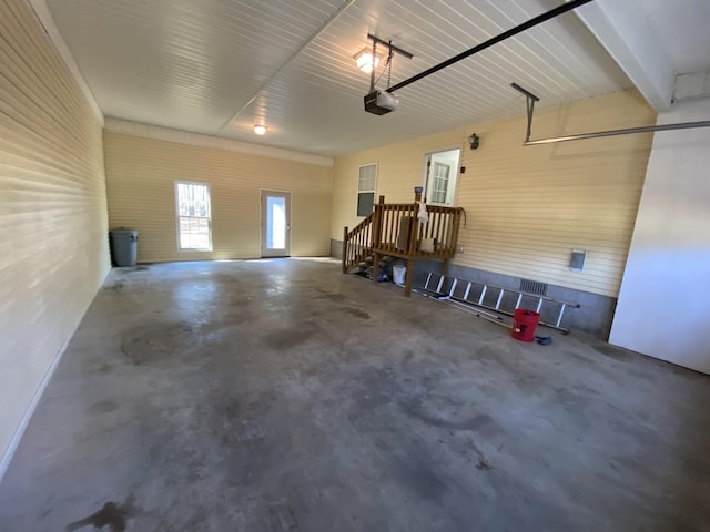 garage featuring a garage door opener