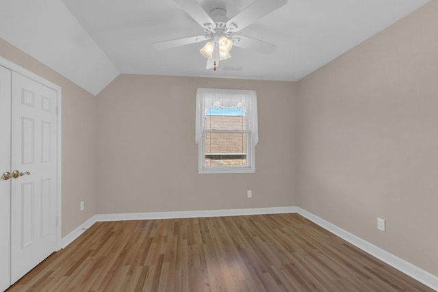 additional living space with ceiling fan, baseboards, and wood finished floors