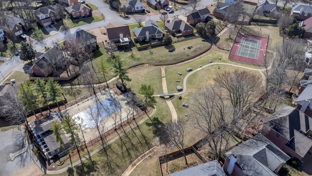 birds eye view of property with a residential view