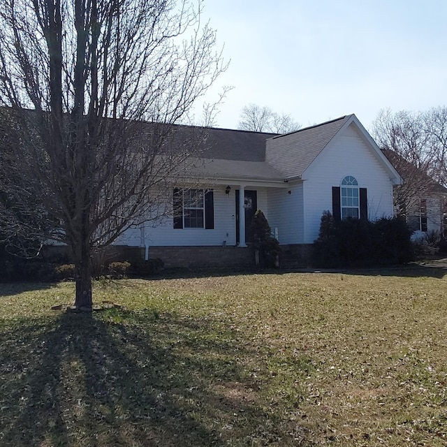 single story home with a front yard