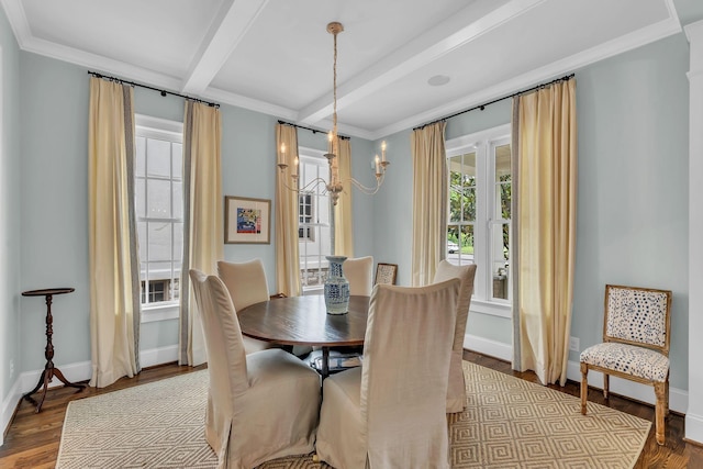 dining area featuring wood finished floors, baseboards, beam ceiling, an inviting chandelier, and crown molding