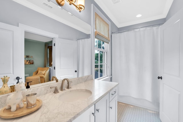 bathroom with ornamental molding, visible vents, vanity, and shower / bath combo with shower curtain