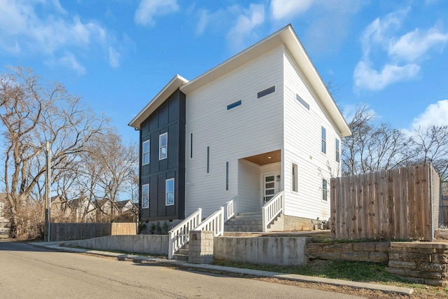 view of front of property with fence