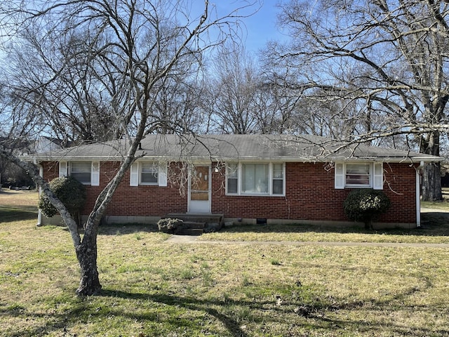 single story home with brick siding and a front lawn