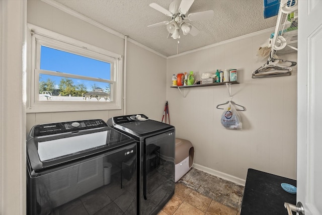 clothes washing area with ornamental molding, ceiling fan, a textured ceiling, washer and dryer, and laundry area